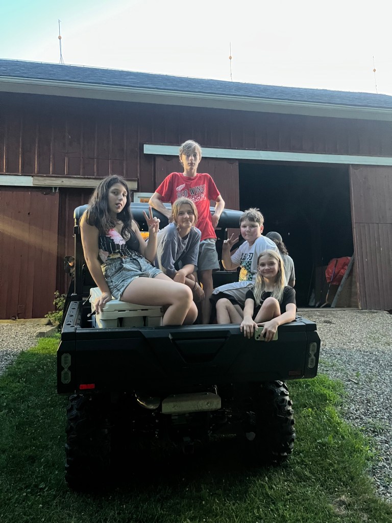 Travel family visiting friends in Michigan by Adventurous Leila.