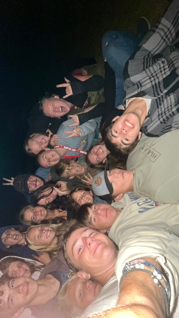 A ton of teens hangout out with a ton of their teen friends at a super fun bus travel family friendly event called Skoolie U.P. in the upper peninsula of Michigan. By Adventurous Leila.